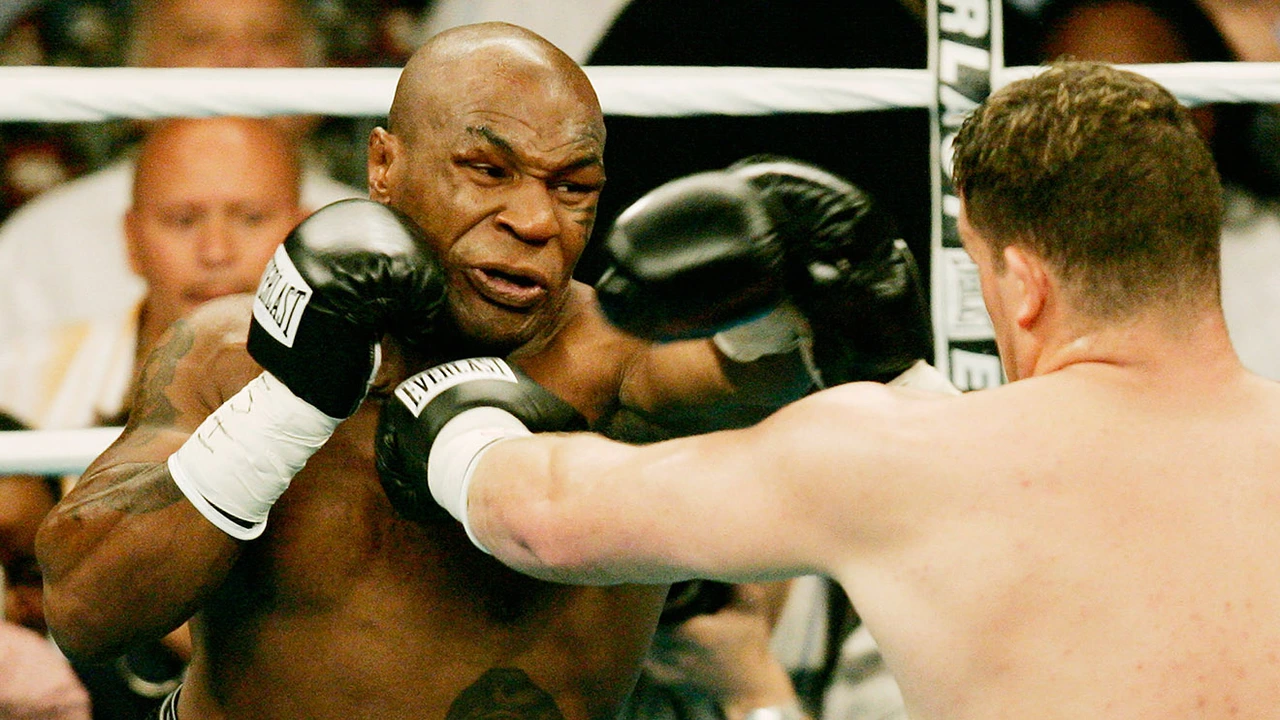 Wie zou er winnen, Mike Tyson vs. John Cena, in een straatgevecht?